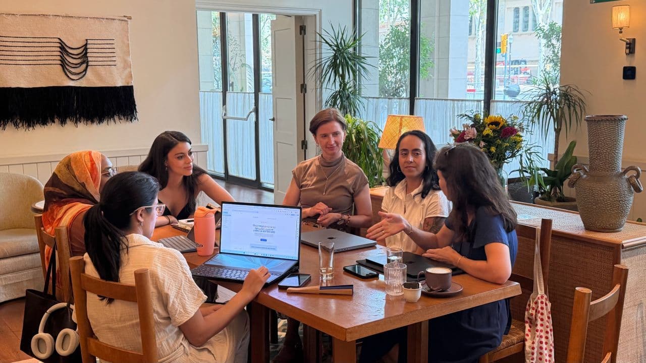 Attendees at a Claude & Coffee session