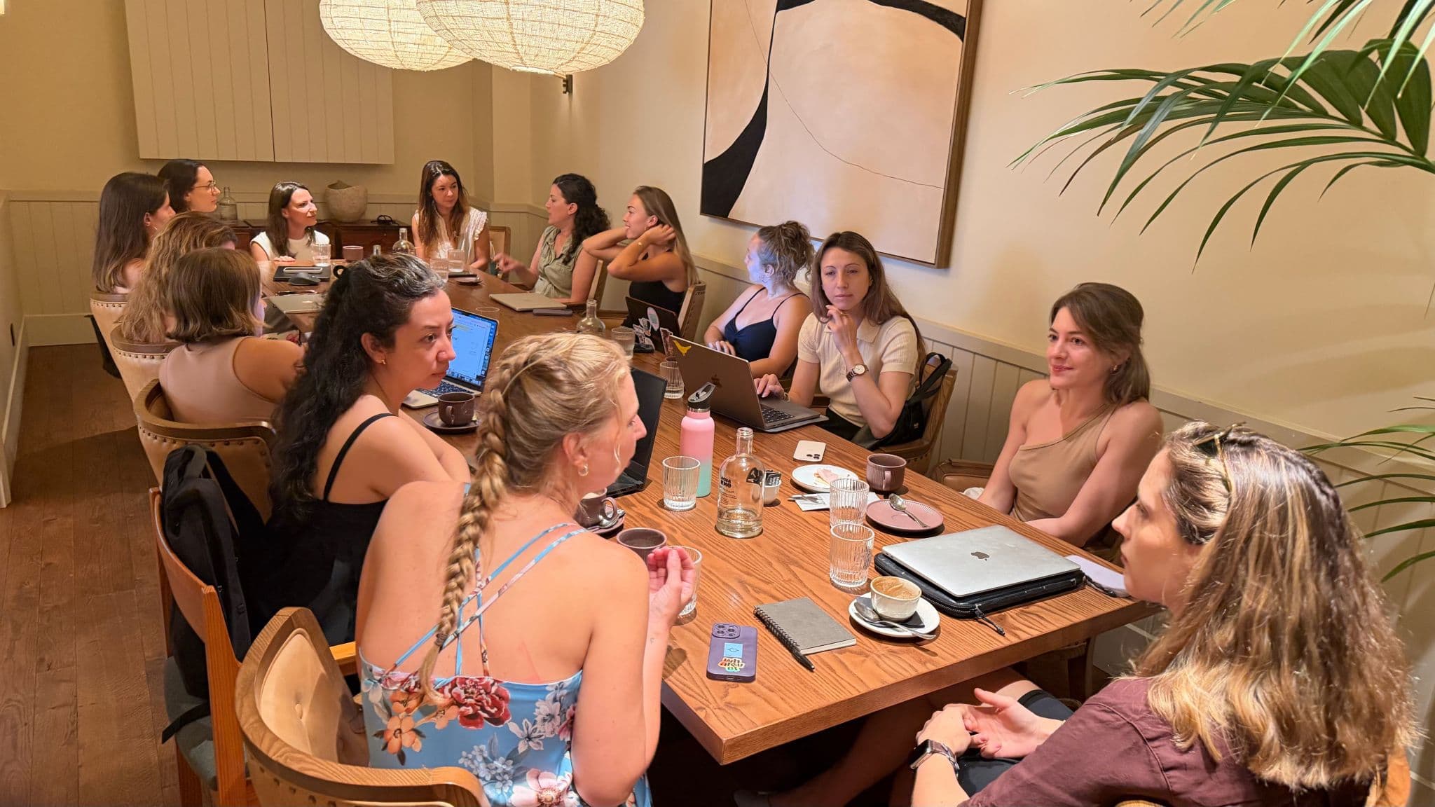 Attendees at a Claude & Coffee session
